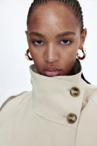 Trenchcoat med knappar 